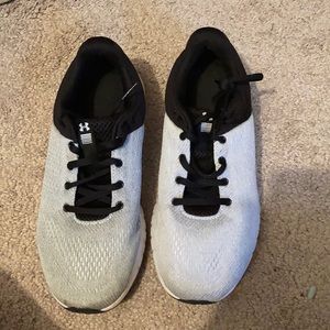 Under Armour light gray and black sneakers